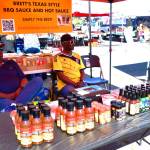 Barbecue and hot sauce were one of the many delicious items for sale at the Federal Way Farmers Market on Saturday, June 29. Photo by Bruce Honda.