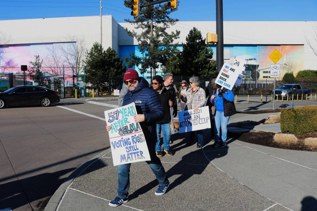 Several different causes were represented at the Renton protest, including voting rights and racial justice. Photo by Bailey Jo Josie/Sound Publishing.