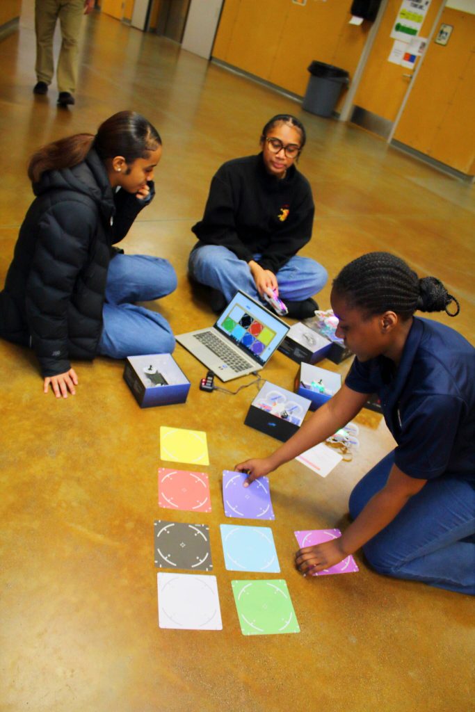 Drones can be operated manually but can also be programmed to accomplish various tasks, like identifying colors. Here students at Todd Beamer in the Air Force ROTC program practice programming drones in preparation for an upcoming competition. Photo by Keelin Everly-Lang / the Mirror