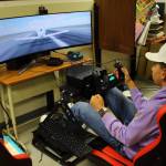 At Kilo Middle School, students are practicing their flight skills with advanced flight simulators that can allow them to experience various airports and weather conditions as they explore a future career as a pilot. Photo by Keelin Everly-Lang / the Mirror