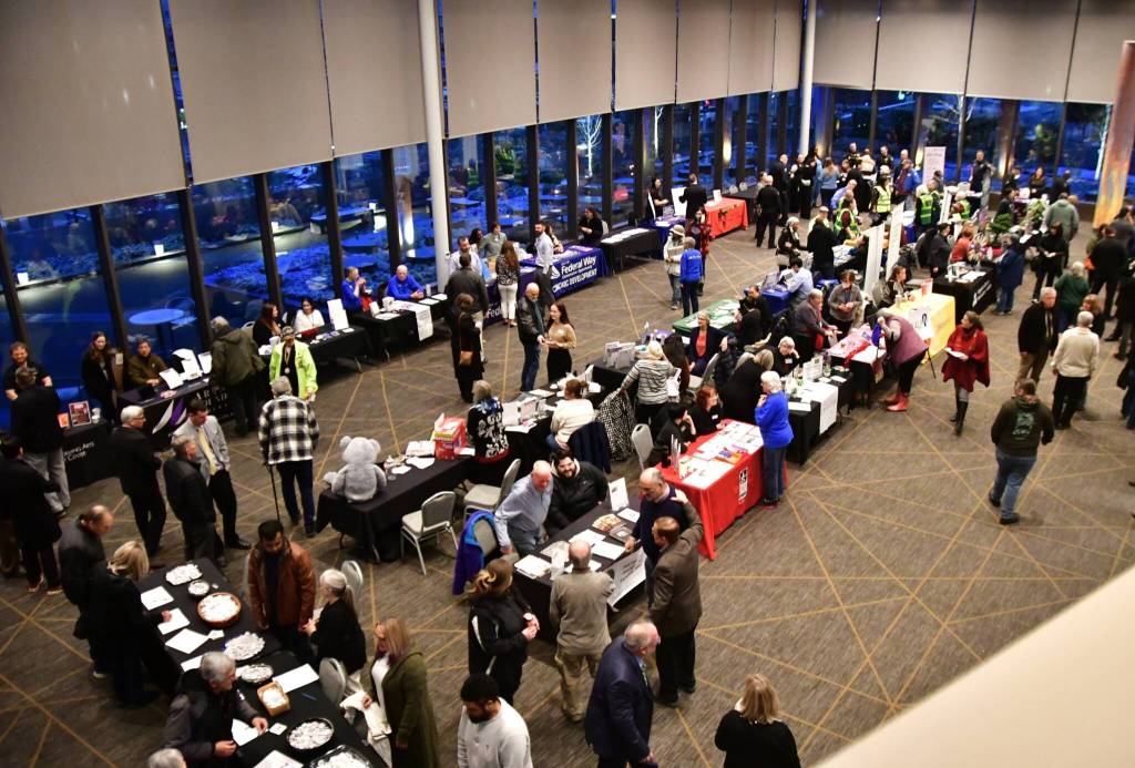 Many community groups were represented at tables in the Performing Arts and Event Center in Federal Way during the Feb. 13 State of the City address. Photo by Bruce Honda.
