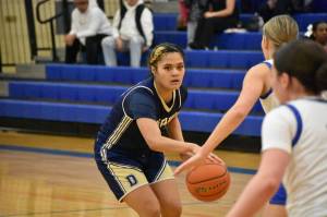 Jerralyn Sevaaetasi dribbles the ball for the Gators. Ben Ray / The Mirror