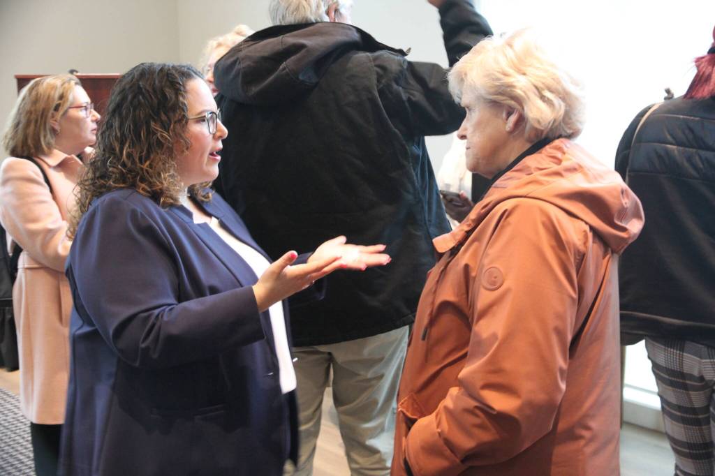 Amanda Santo, COO of the Multi Service Center and Federal Way City Councilmember Linda Kochmar connect at the Grand Opening. Photo courtesy of Ben Miller at the City of Federal Way.