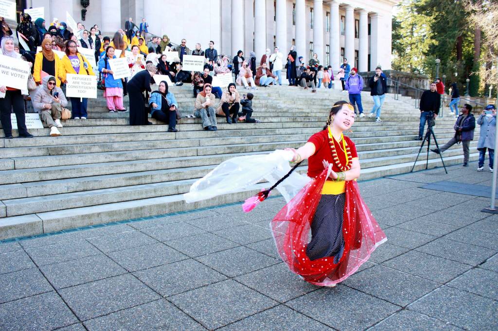The Advocacy day began with a performance by a Nepalese dancer in front of the north steps of the Legislative Building in Olympia, Washington. Photo by Keelin Everly-Lang / the Mirror