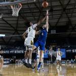 Senior Brayden McVey goes up for a shot against Lincoln. Maria Dorsten Photography