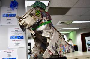 On March 12, the Federal Way Mirror hosted an open house to celebrate the Best of Federal Way winners. Visitors to the Mirror office participated in a contest to name this dragon made of newspapers. The winning name is PRESSton. Photo by Bruce Honda