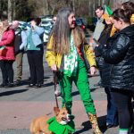 Guests at the flag raising event were decked out in green - even down to the dogs! Photo by Keelin Everly-Lang/the Mirror