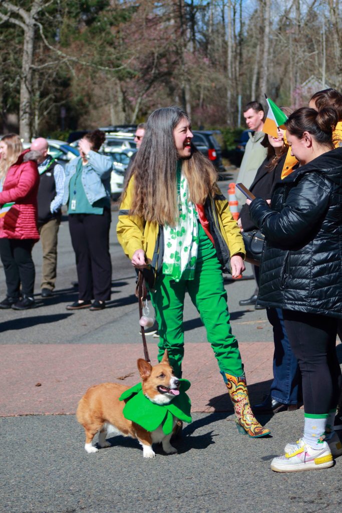 Guests at the flag raising event were decked out in green - even down to the dogs! Photo by Keelin Everly-Lang/the Mirror
