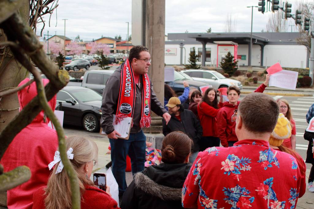 President of FWEA James Brown speaks to the crowd during the demonstration on March 19 about the need for funding to support the district.