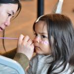 Facepainting was just one of many activities offered at the All the Worlds a Stage event for Earth Day on April 19. Photo by Bruce Honda
