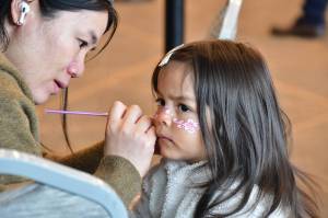 Facepainting was just one of many activities offered at the All the Worlds a Stage event for Earth Day on April 19. Photo by Bruce Honda