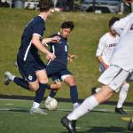 Adrian Alonso takes a shot against Enumclaw for Todd Beamer. Ben Ray / The Mirror