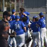 Titus Gillihan is showered with water after hitting the game-winning hit. Ben Ray / The Mirror
