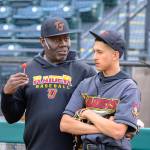 Joe Townsend and a young Raider pitcher discuss tactics at Cheney Stadium. Photo by Dee Torres