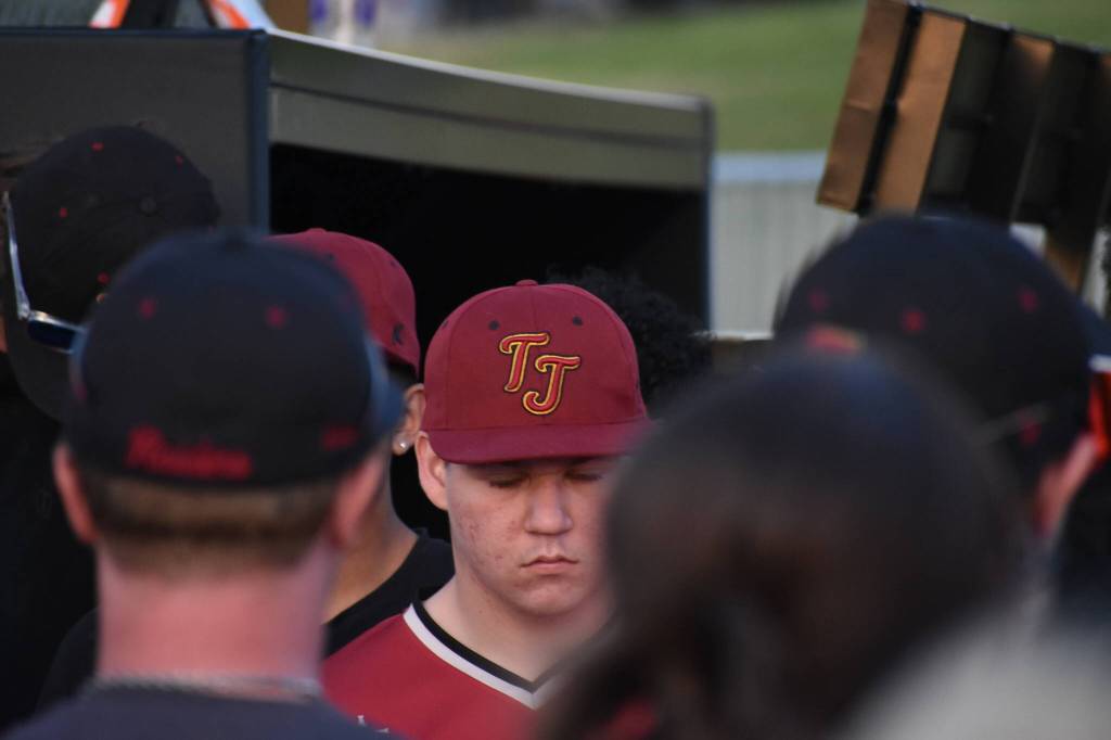 Thomas Jefferson players remember Townsend during his candlelight vigil. Ben Ray / The Mirror