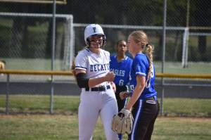 Audrey Deviney gives a smile and a fist bump to Meegan Meagher on second base. Ben Ray / The Mirror