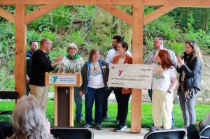 KEEP shares one last gift toward Camp Kilworths future at the grand opening on May 7. Camp Kilworth is located at 30900 50th Ave. SW, Federal Way, near Dash Point State Park. Photo by Keelin Everly-Lang / the Mirror