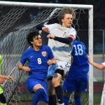 Dylan Lang makes a clearing header on a corner kick for Decatur. Ben Ray / The Mirror