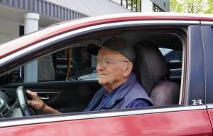 Henry Lazzar in his car. Photo by Joshua Solorzano/The Mirror