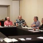 Rosi Bolatagici of PICA-WA, David Berg, and David Harrison of FUSION talk with consultants Aaron Zaretsky and David Berg about the feasibility study and possibility of Federal Way Public Market in general. Photo by Keelin Everly-Lang / the Mirror