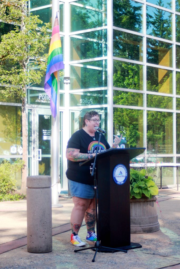 Allison Fine speaks at the Pride flag raising at City Hall, sharing the history of how the flag came to be flown in the city - which was in part due to her advocacy - and about the challenges still faced by the LGBTQ community. Photo by Keelin Everly-Lang / the Mirror
