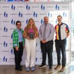 Meeghan Meagher stands with Dr. Dani Pfeiffer (left), Federal Way Director of Equity and Athletics John Yellam (center right) and Federal Way Mirror Sports Reporter Ben Ray (far right). Photo provided by FWPS.