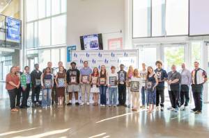 All 16 nominees and their athletic directors stand together at the Athlete of the Year Ceremony on June 2 at Federal Way High School. Photo provided by FWPS.