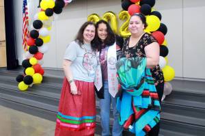 Amanda Rambayon, student Natalie (Pretty Morning Woman) Reevis and her mother Maggie Gilham celebrate graduation. Photo by Keelin Everly-Lang / the Mirror.