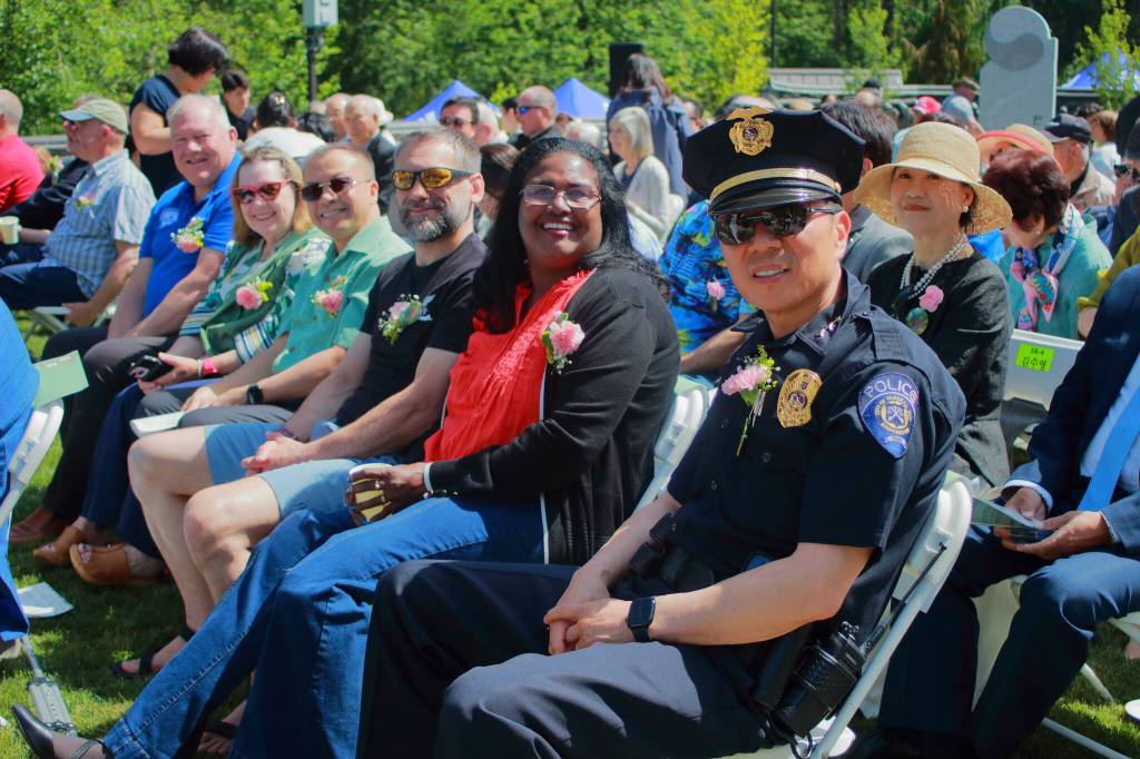 Councilmembers Jack Dovey, Susan Honda, Hoang Tran, Paul McDaniel, Lydia Assefa-Dawson and Federal Way Police Chief Andy Hwang all enjoy the festivities at the grand opening ceremony of the Hanwoori Garden. 
Photo by Keelin Everly-Lang / the Mirror