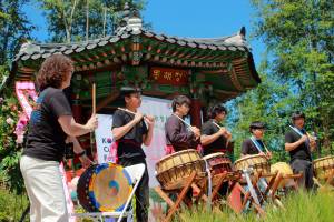 The Asian Student Association of Decatur High School performs Arirang Nanta in the grand finale performance of the grand opening ceremony, directed by WhanHee Yi. Photo by Keelin Everly-Lang / the Mirror