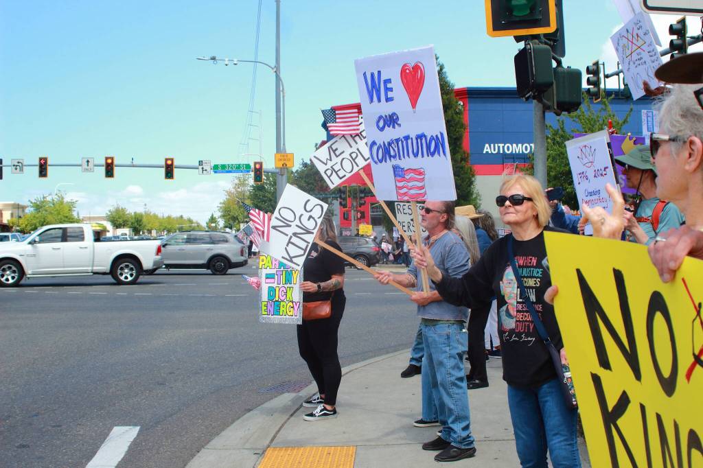 Protesters at the No Kings demonstration in Federal Way at the corner of Pacific Highway S. and S. 320th St. Photo by Keelin Everly-Lang/the Mirror