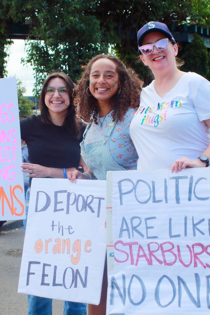 Kiahna B., Karrie C. and Kellie L. at the No Kings demonstration Saturday, June 14. Photo by Keelin Everly-Lang/the Mirror