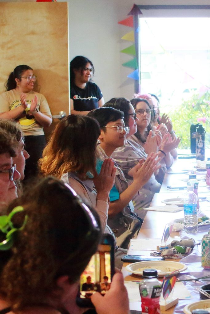 Graduates, faculty, parents and friends cheer for graduates at the Lavender Graduation put on by the Highline LGBTQIA Task Force. Photo by Keelin Everly-Lang / the Mirror