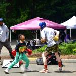 There were many activities for youth including this one at Juneteenth. Photo by Bruce Honda.