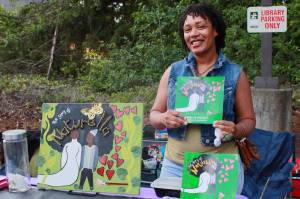 Juneteenth featured many vendors including this local author and storyteller. Photo by Keelin Everly-Lang / the Mirror