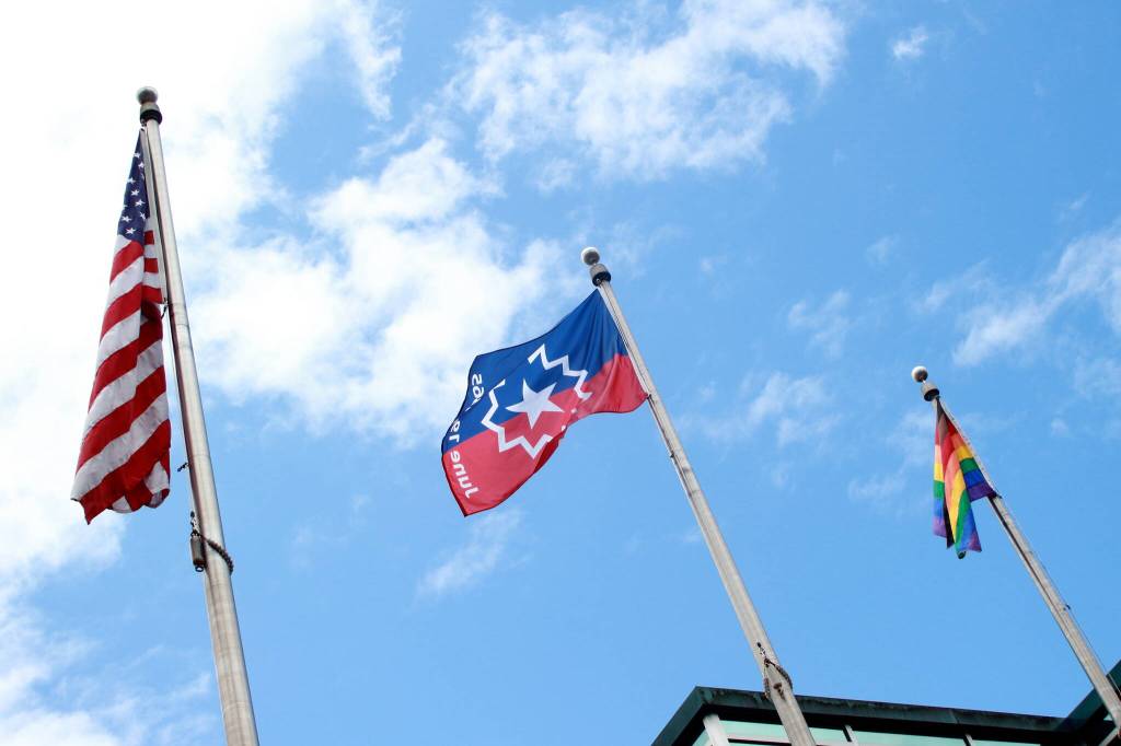 The American flag, Juneteenth flag and Pride flag fly together at Federal Way City Hall. Photo by Keelin Everly-Lang / the Mirror