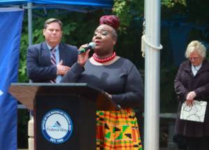 Pamela Bowman performed the National Anthem and the Black National Anthem (Lift Every Voice and Sing) at the Juneteenth flag raising at City Hall. Photo by Keelin Everly-Lang / the Mirror
