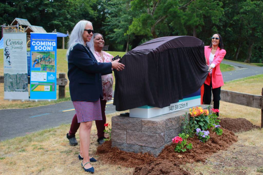 Descendants of the Conna family unveil the new sign for Conna Park in Federal Way. Photo by Keelin Everly-Lang / the Mirror