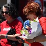 Volunteers pick up some bouquets of flowers at the Federal Way Farmers Market after a busy morning of volunteering. Photo courtesy of We Love Our City Federal Way