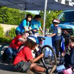 Kids learn about safety and bike maintenance at the Mirror Lake Bike Safety Day in May 2025. Photo by Shelley Pauls.