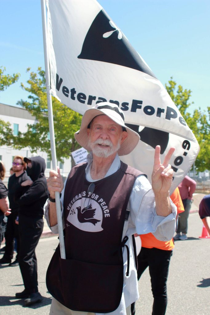 Demonstrators represented many different groups, including Common Good Tacoma, La Resistencia and this representative from Veterans For Peace. Photo by Keelin Everly-Lang / the Mirror