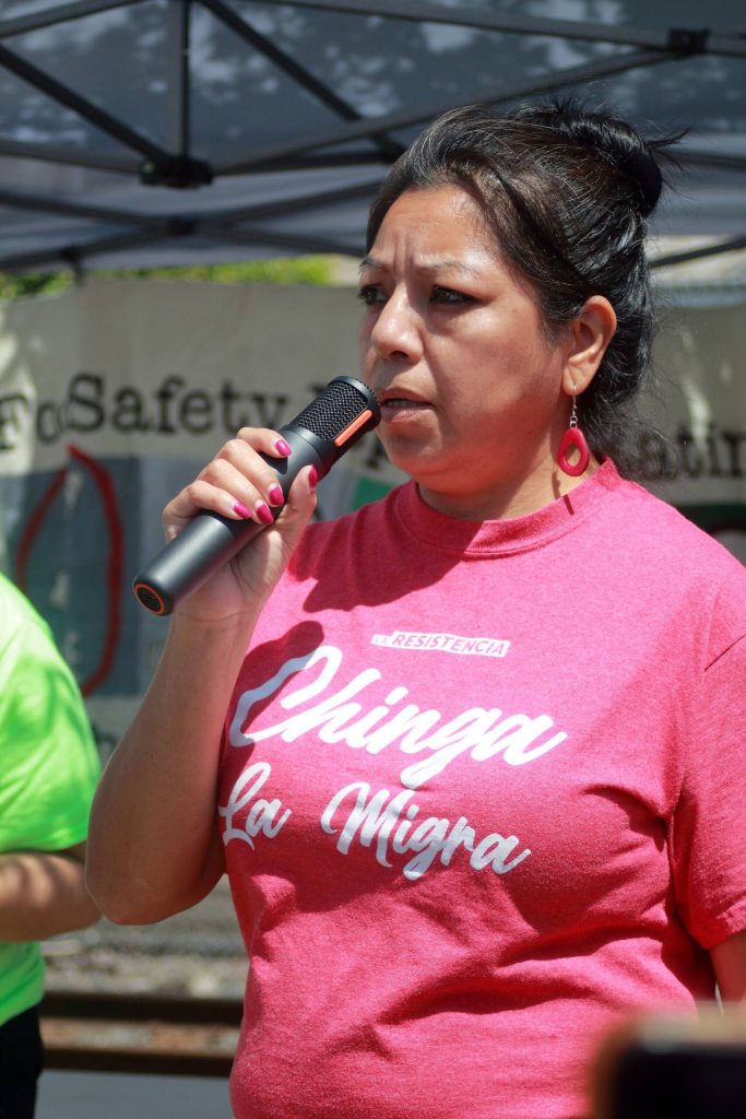 Rufina Reyes leads local organization La Resistencia, which was originally founded in 2014 to support a hunger strike launched by over 1,200 people detained in Tacoma to protest their confinement. La Resistencia began under the umbrella of the national #Not1More campaign as NWDC Resistance. Here she speaks at a solidarity demonstration on July 5. Photo by Keelin Everly-Lang / the Mirror