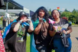 Vinnie, Fawn L. and Nea celebrating Pride at Town Square Park on Aug. 2. Photo by Keelin Everly-Lang / the Mirror