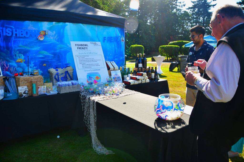 The FUSION gala included fun and games this year, like this fishbowl activity. Photo by Bruce Honda.