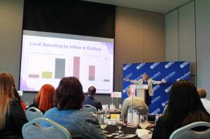 Rebecca Martin describes the impacts of inflow and outflow of Federal Way workers and job opportunities on local business at the State of the Chamber luncheon on Aug. 6. Photo by Keelin Everly-Lang / the Mirror