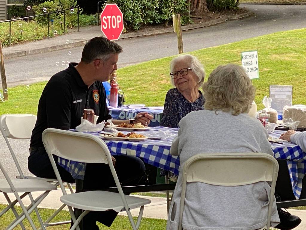 Residents at Village Green during National Night Out. Photo by Mariah Hill/For the Mirror