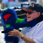 Bob Darrigan with a puppet at the Federal Way Farmers Market. Photo by Bruce Honda