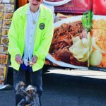 Bob Darrigan with a puppet at the Federal Way Farmers Market. Photo by Bruce Honda