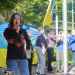 12-year-old Zlata sings the Ukrainian National Anthem as the flag is raised for the first time at Federal Way City Hall. Photos by Keelin Everly-Lang / the Mirror