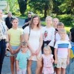 Lesia Vsach and her nine children moved to Federal Way from Ukraine a year ago and shared through a translation app that seeing the flag in Federal Way brings a feeling of home, seeing a part of yourself and a part of your life there in Ukraine. Photos by Keelin Everly-Lang / the Mirror